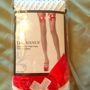 Thigh high fish net with Nurse badge 
Brand new